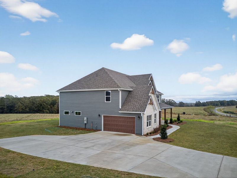 Front exterior of a new home in GRAY ROAD, Roopville, GA, highlighting curb appeal (Image 21).