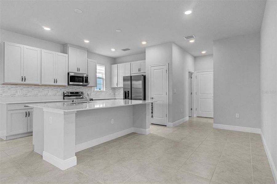 Furnished interior view inside a new home in , St. Cloud (Image 14).