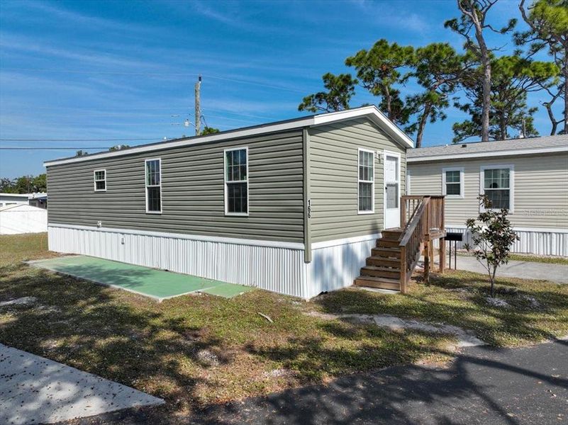 Exterior details and patio area of a home in , Englewood (Image 17).