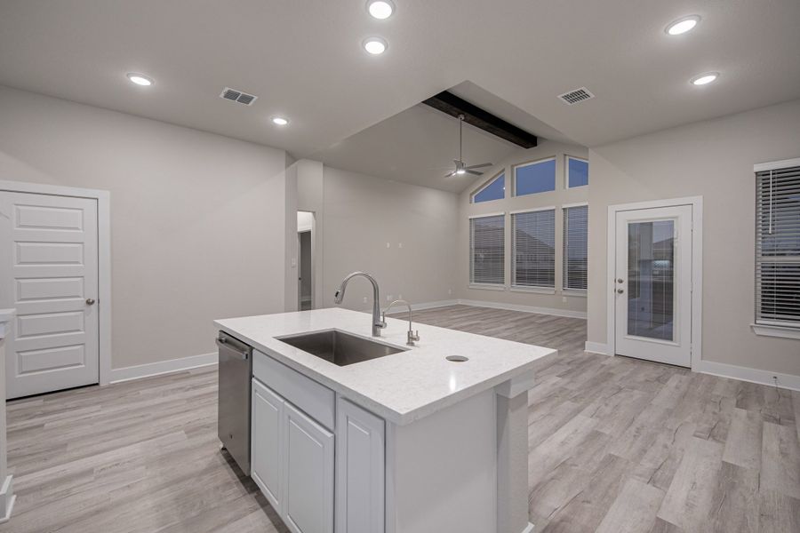 Representative furnished interior of a home built from the Morgan by Chesmar Homes in Stillwater Ranch, San Antonio (Image 6).