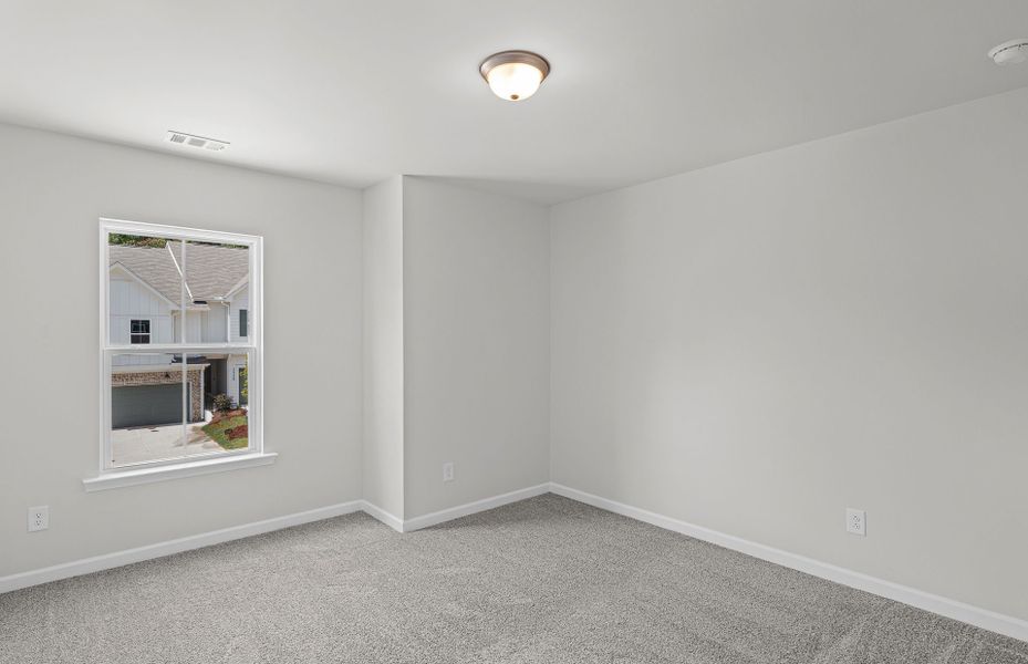 Spacious, unfurnished interior of a new home in Ansley Towns, Cumming (Image 18).
