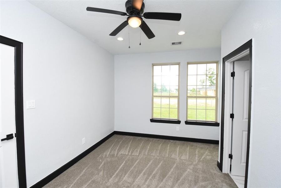 On the entrance to your left, you'll discover this room with its own private full bath.Full bath with a tub-shower combo and quartz countertop, serving one room.