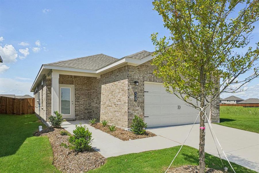 Front exterior of a new home in Windmill Farms, Forney, TX, highlighting curb appeal (Image 14). Front exterior of a new home in Windmill Farms, Forney, TX, highlighting curb appeal (Image 14).