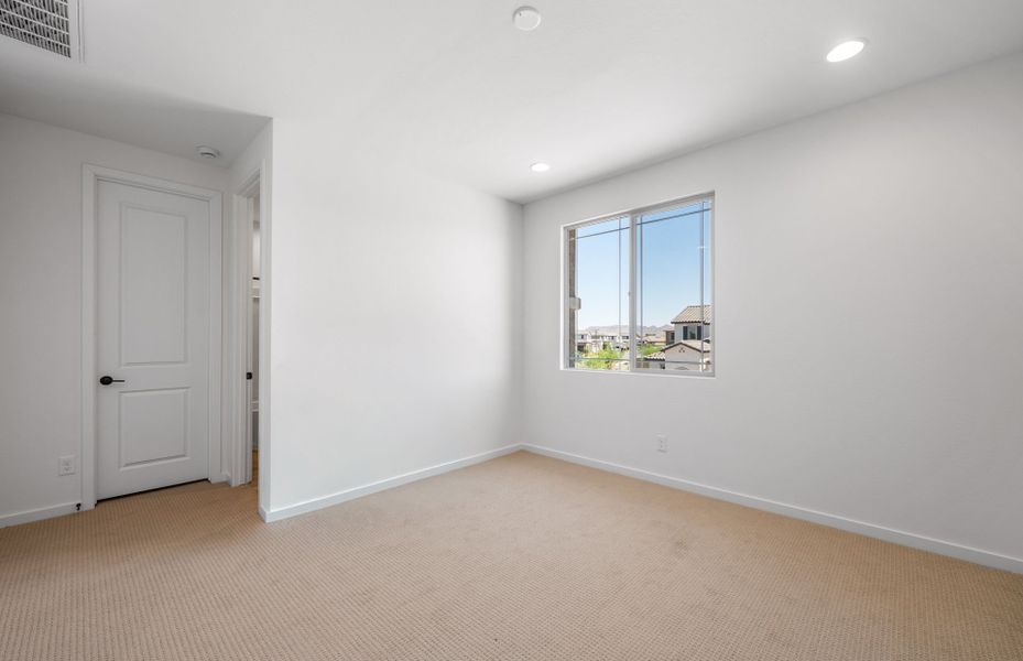 Spacious, unfurnished interior of a new home in Legado West, Queen Creek (Image 28).