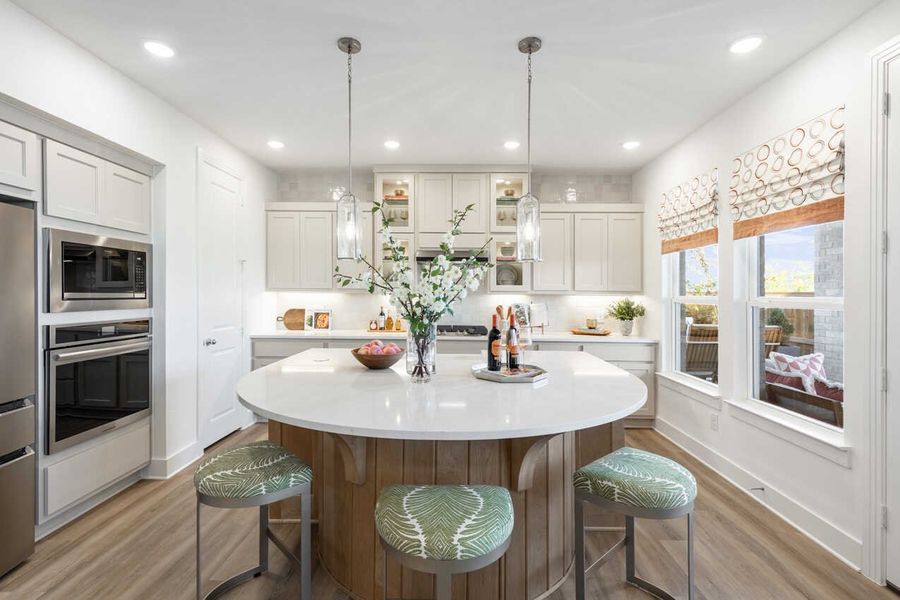 Representative furnished interior of a home built from the Monet-SS by Highland Homes in Lariat, Liberty Hill (Image 7).