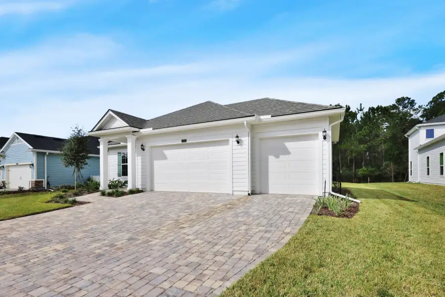 Representative exterior photo of a completed home built from the Eliza by Riverside Homes in Sagebrush at EverRange, Jacksonville, FL (Image 35).
