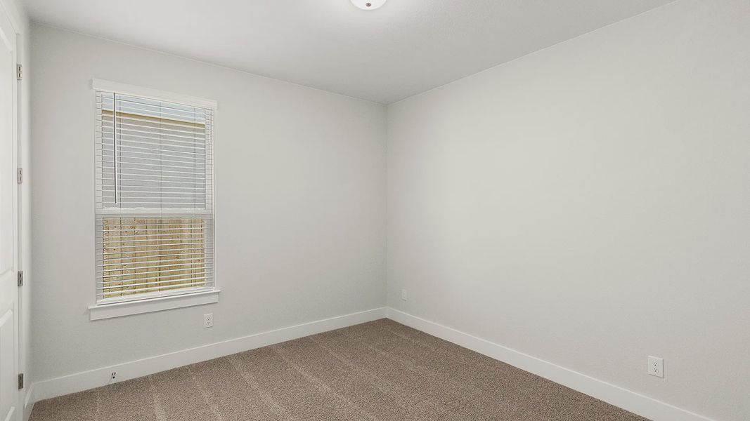 Representative unfurnished interior of a home built from the Brenner by Chesmar Homes in Newhaven, Manor (Image 30).
