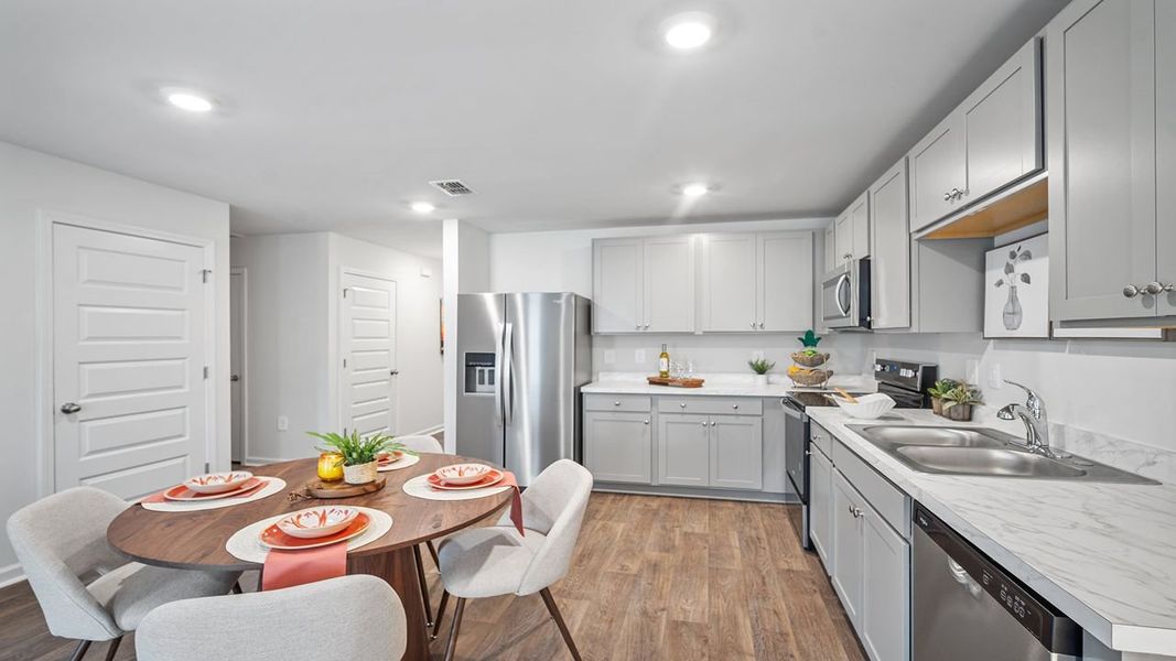 Representative furnished interior of a home built from the Sullivan by D.R. Horton in Rice Hope, Port Wentworth (Image 6).
