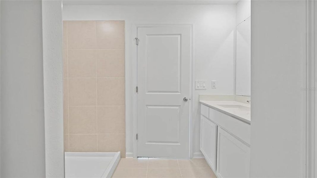 Furnished interior view inside a new home in Peace Creek Reserve: Manor Key Collection, Winter Haven (Image 4).