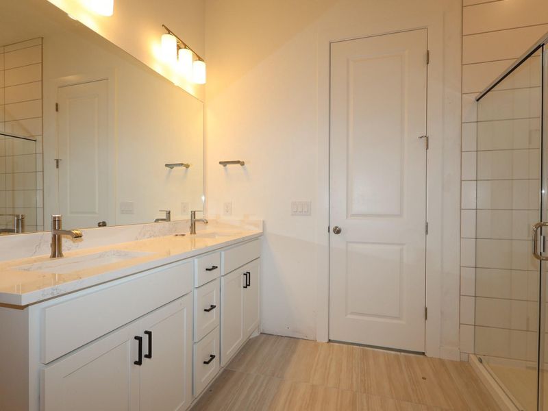 Furnished interior view inside a new home in Colony at Cole Springs, Buda (Image 6).