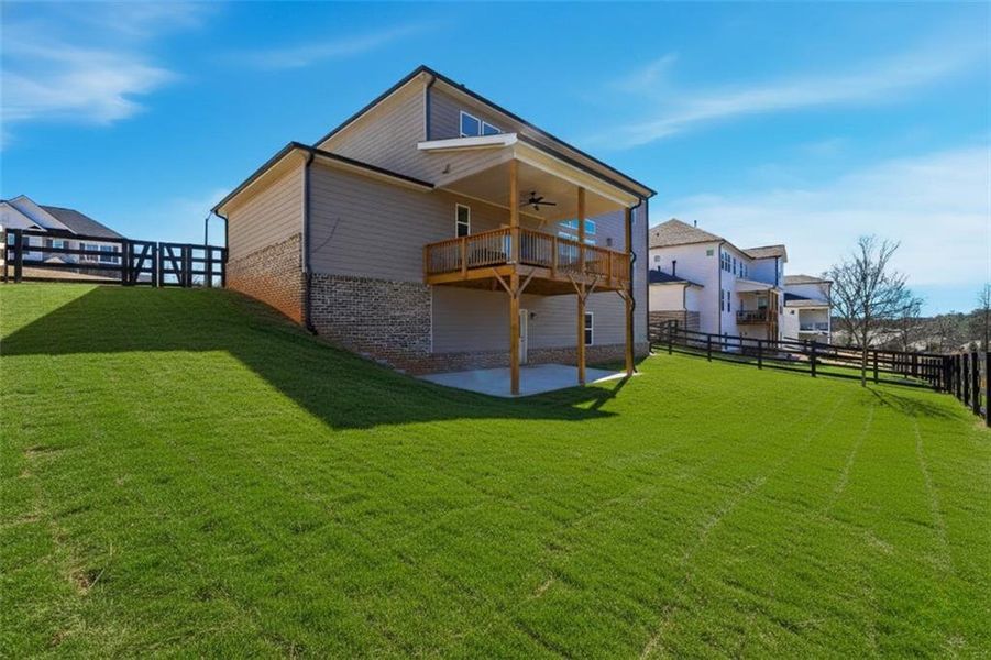 Exterior details and patio area of a home in Carmichael Farms, Canton (Image 4).