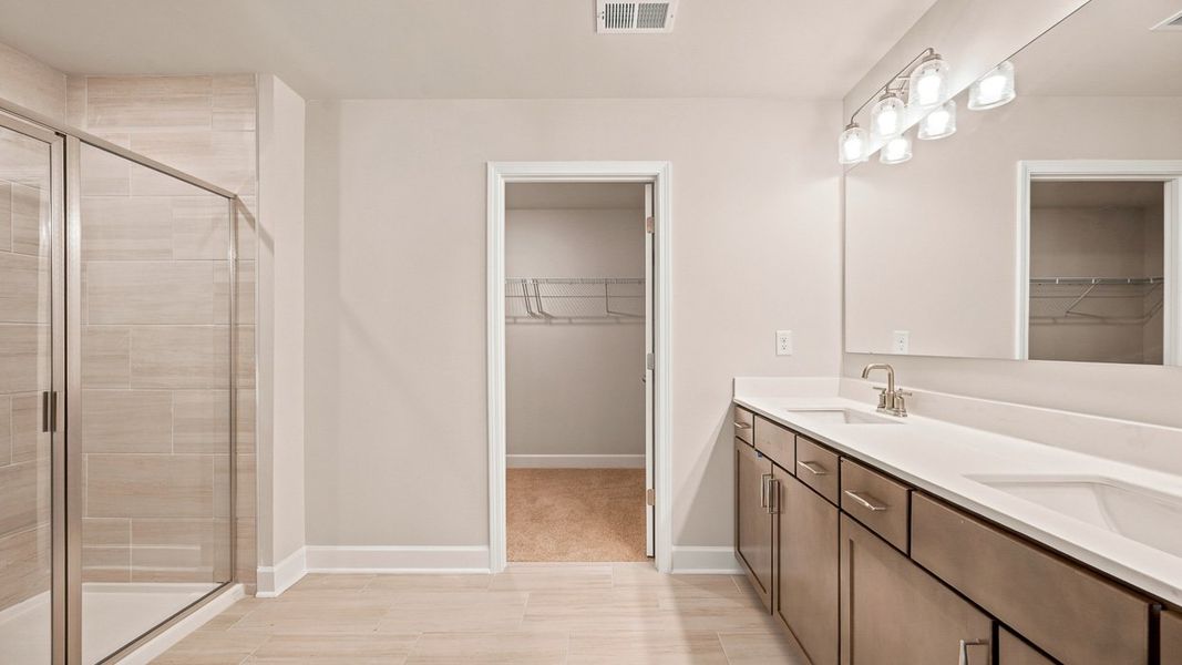 Representative furnished interior of a home built from the Emerson by D.R. Horton in Evergreen Crossing, Locust Grove (Image 15).