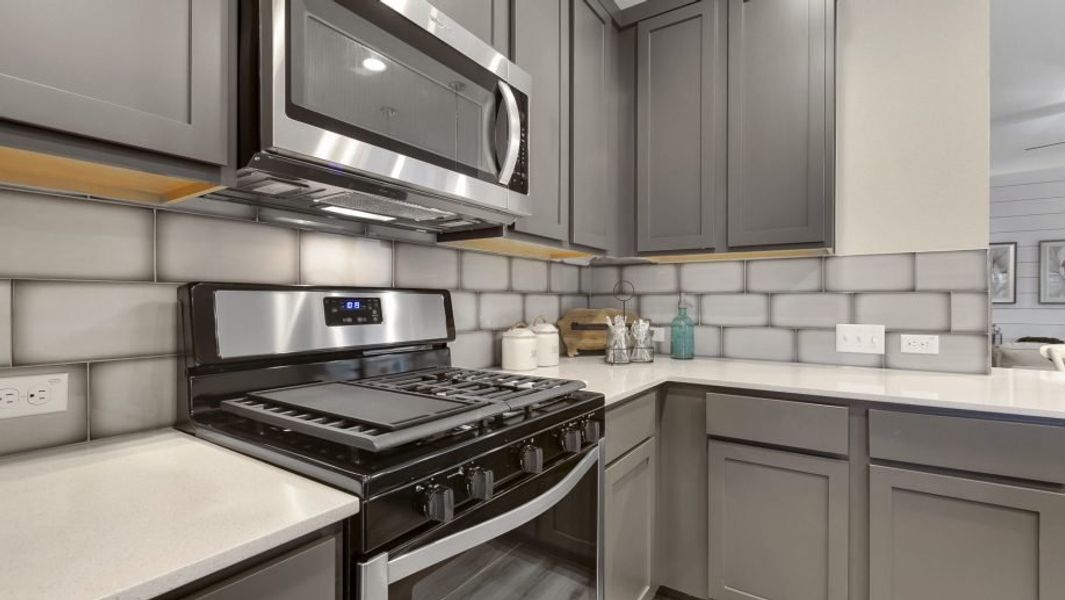 Representative furnished interior of a home built from the Houston by Pacesetter Homes in Village At Manor Commons, Manor (Image 7).