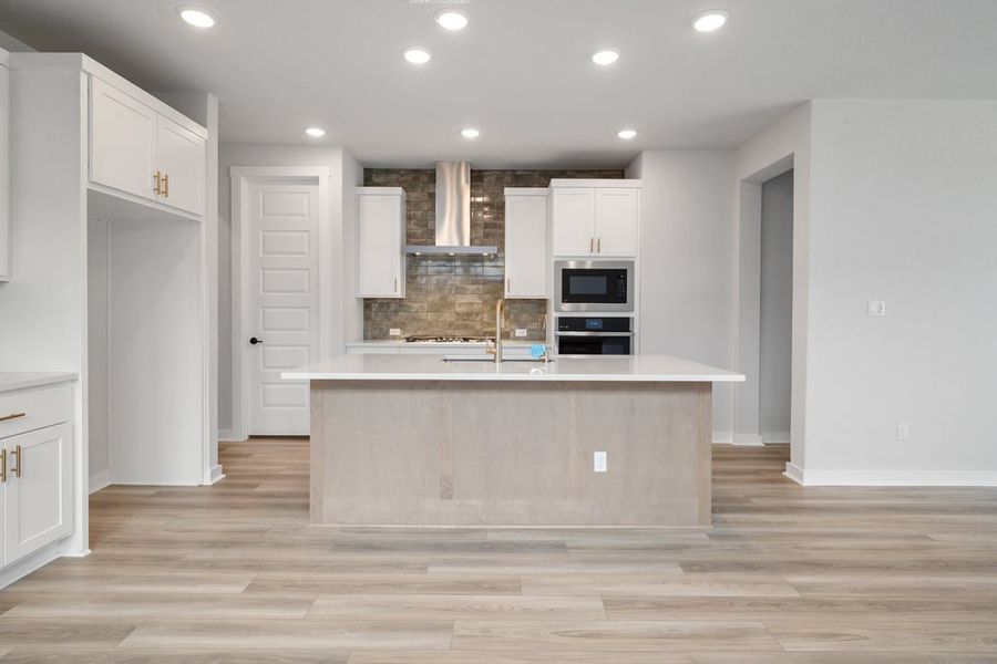 Furnished interior view inside a new home in Terrace Collection at Lariat, Liberty Hill (Image 7). Furnished interior view inside a new home in Terrace Collection at Lariat, Liberty Hill (Image 7).