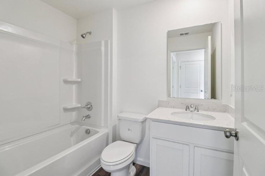 Furnished interior view inside a new home in Palm Bay Classic, Palm Bay (Image 6).