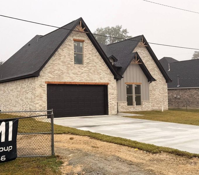 Front exterior of a new home in , Beaumont, TX, highlighting curb appeal (Image 2).