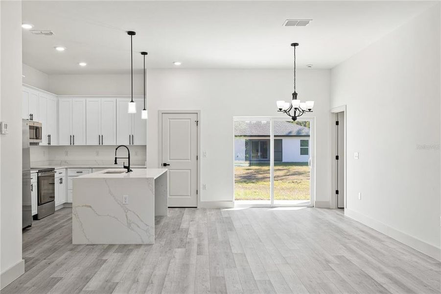 Furnished interior view inside a new home in , Port Charlotte (Image 7).