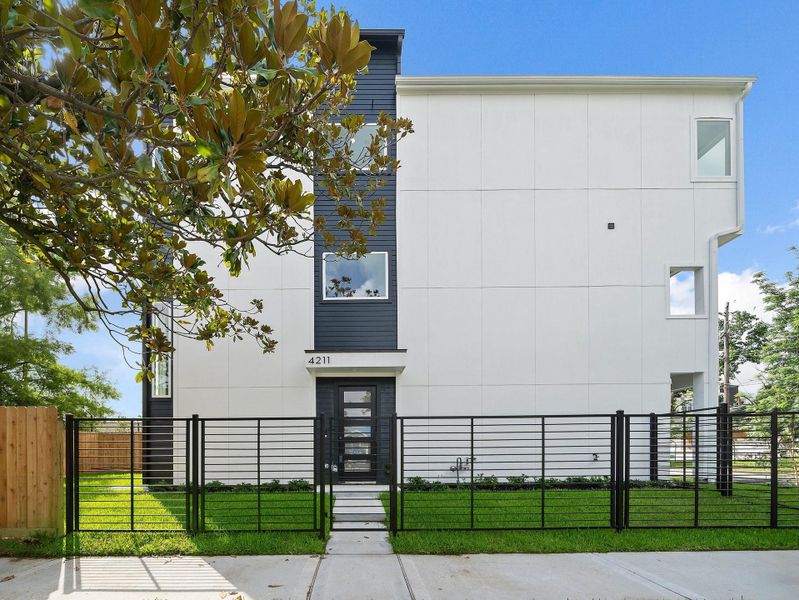 Front exterior of a new home in Crawford Place, Houston, TX, highlighting curb appeal (Image 19).