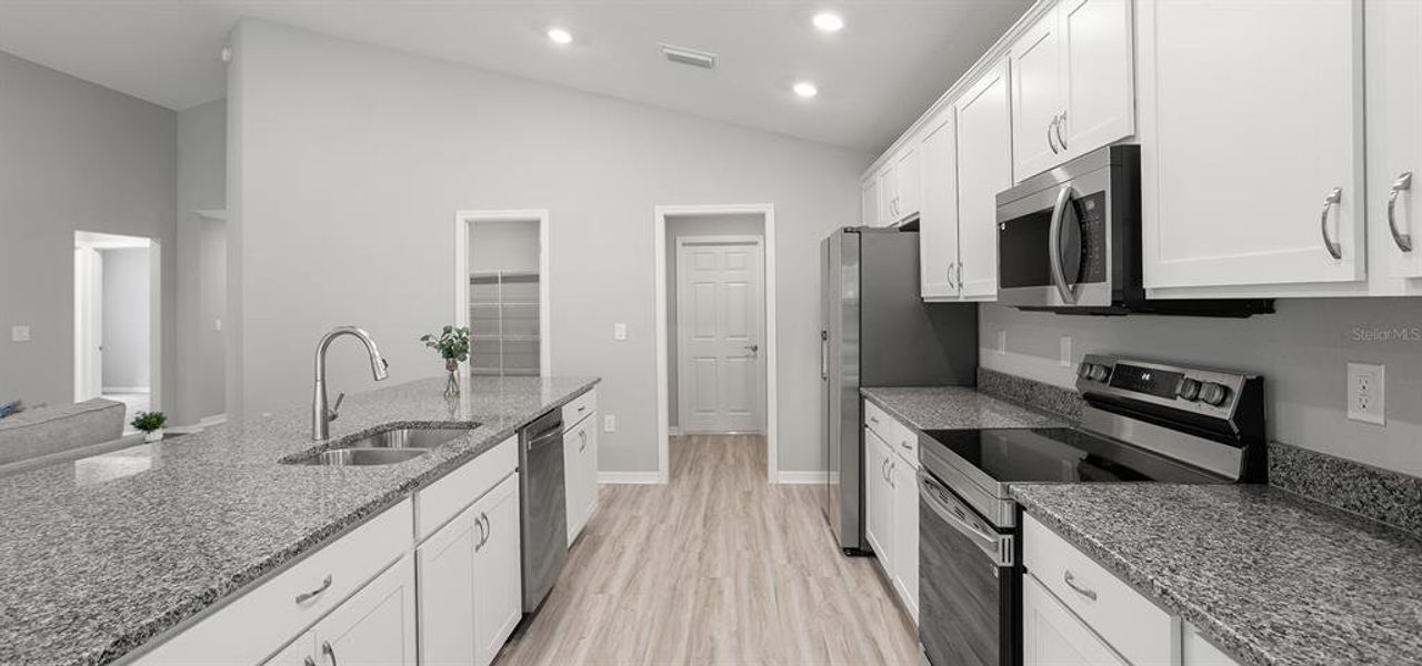 Furnished interior view inside a new home in Vista Trace, Belleview (Image 9).