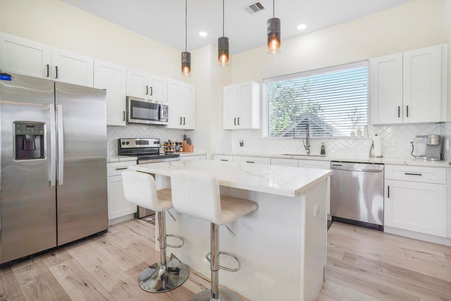 Open kitchen to the living and dining room