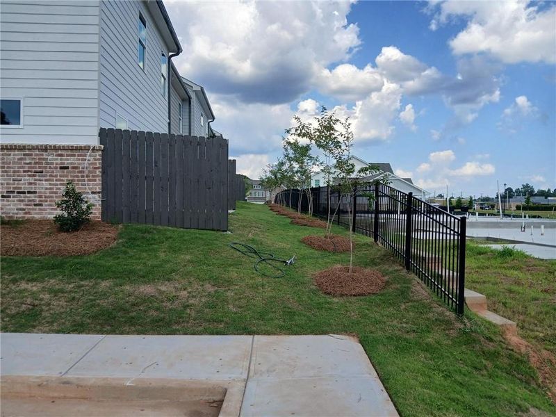 Exterior details and patio area of a home in Union Village, McDonough (Image 24). Exterior details and patio area of a home in Union Village, McDonough (Image 24).