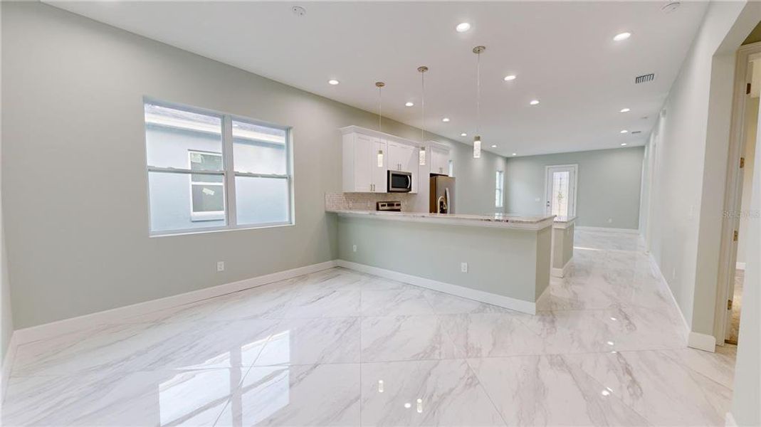 Dining Room with Kitchen & Living Room View