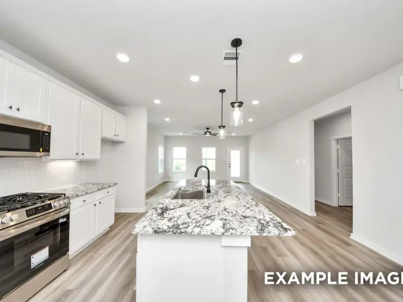 Furnished interior view inside a new home in Sundance Cove, Crosby (Image 3).