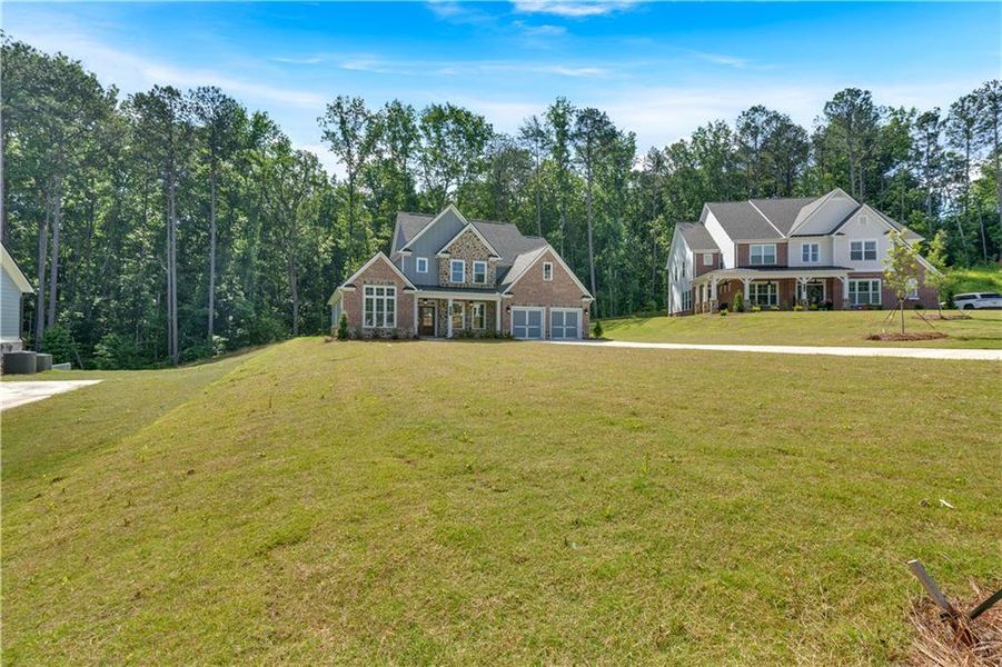 Front exterior of a new home in Ford Landing, Acworth, GA, highlighting curb appeal (Image 2).