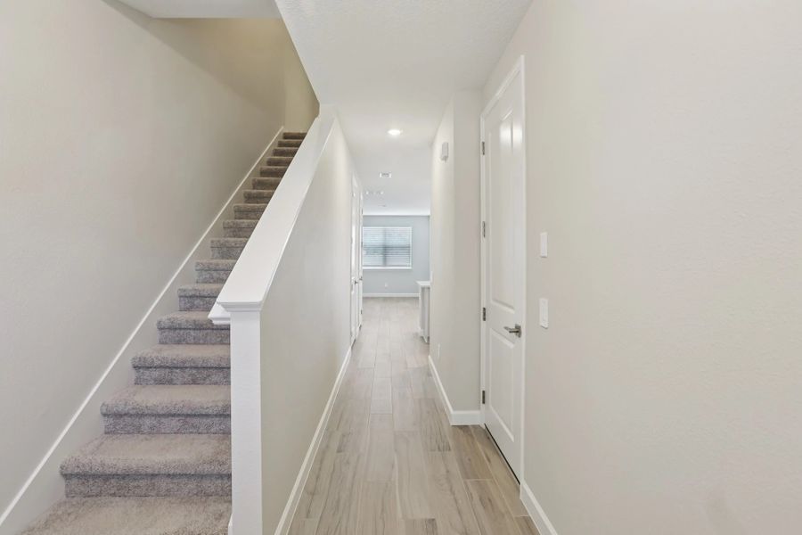 Front entry opens up into bright and airy foyer