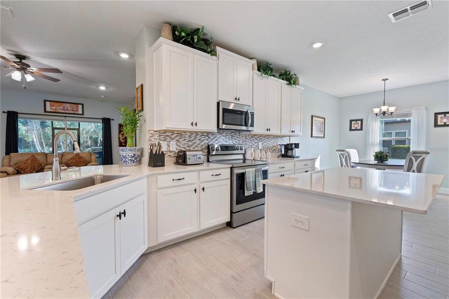 Furnished interior view inside a new home in Grand Park North, Dunnellon (Image 38).