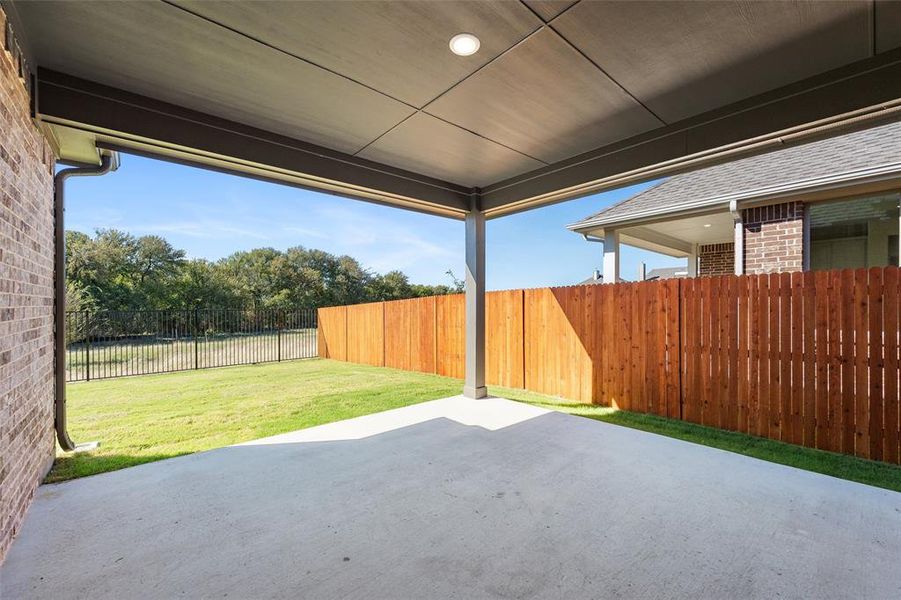 Exterior details and patio area of a home in Morningstar, Aledo (Image 3).