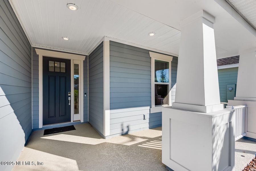 Exterior details and patio area of a home in Colbert Landings, Palm Coast (Image 4).