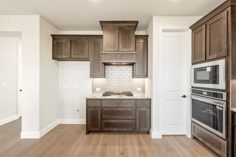 Furnished interior view inside a new home in Creekview Meadows, Pilot Point (Image 12).