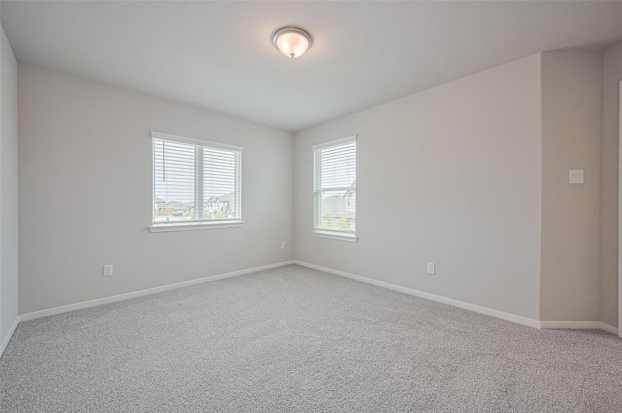 Spacious, unfurnished interior of a new home in Sunterra, Katy (Image 21).