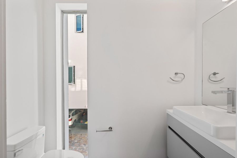 Half bath on the main living floor ideal for guests and ease.