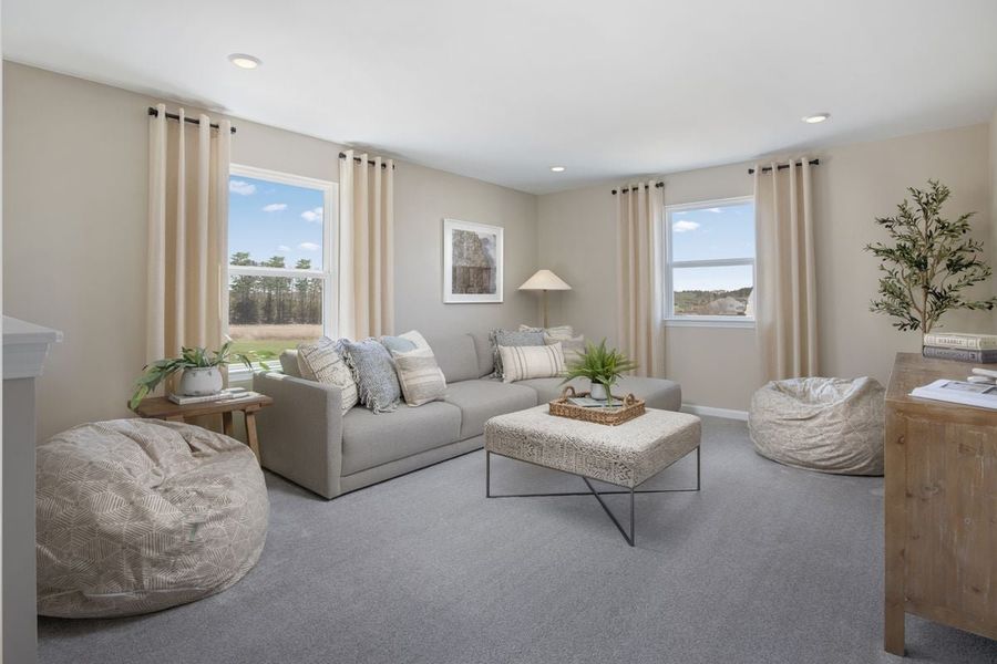 Representative furnished interior of a home built from the 2539 by KB Home in Utley Farms, New Hill (Image 7).