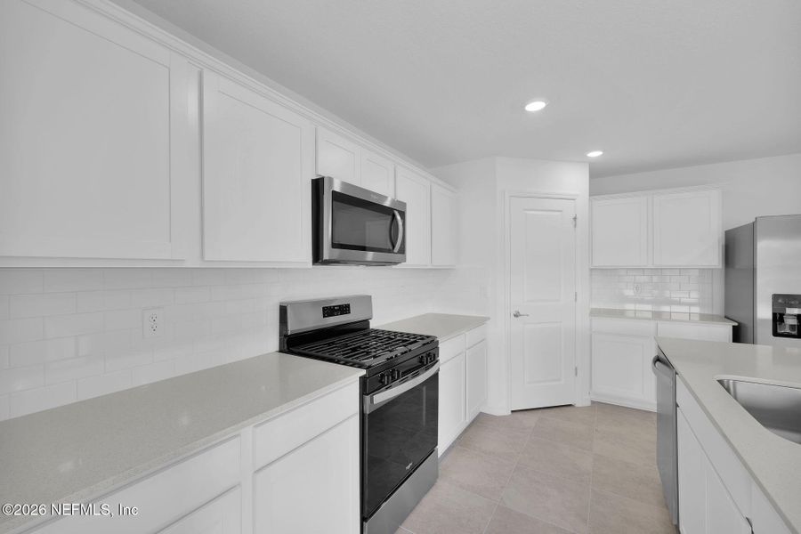 Furnished interior view inside a new home in Wells Landing, Jacksonville (Image 5).
