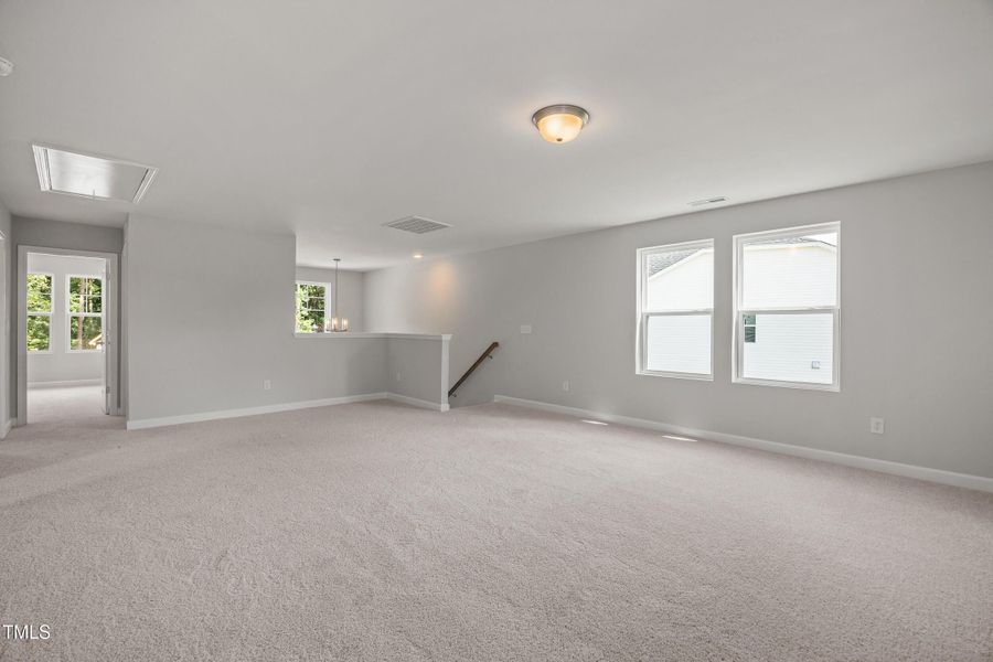 Spacious, unfurnished interior of a new home in Woodland Crossing, Zebulon (Image 16).