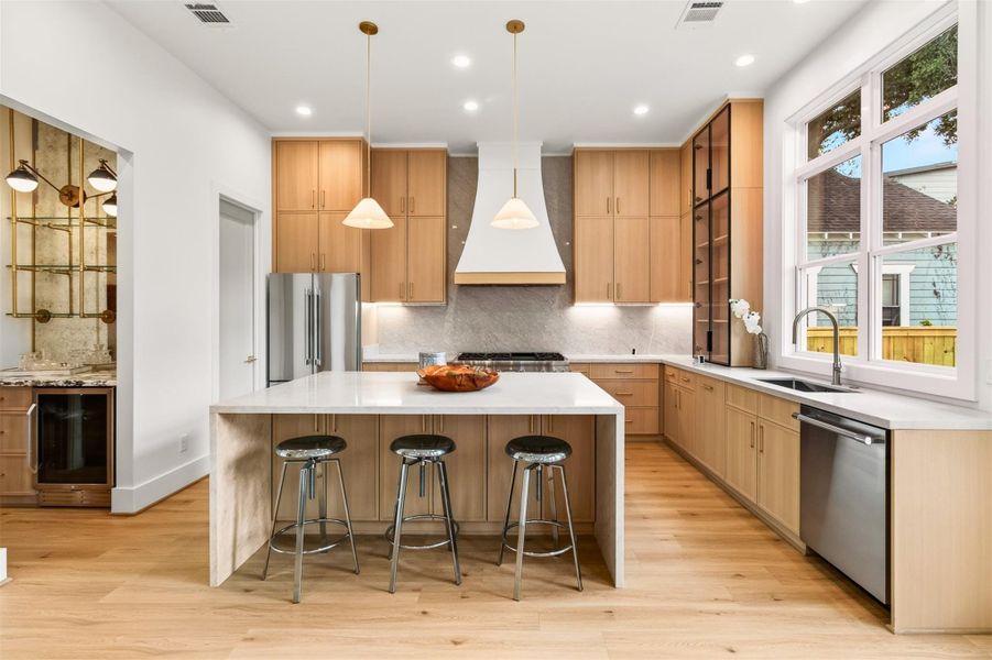 The kitchen is the heart of the home, showcasing designer selections, generous prep space, and an open-concept layout that flows seamlessly into the living area. The kitchen is the heart of the home, showcasing designer selections, generous prep space, and an open-concept layout that flows seamlessly into the living area.
