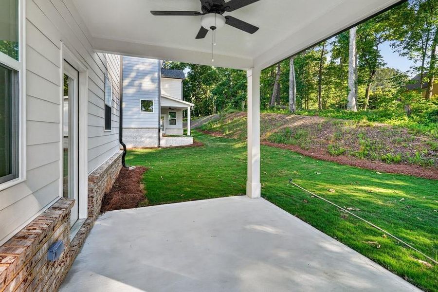 Exterior details and patio area of a home in Bailey Fence, Dacula (Image 24).