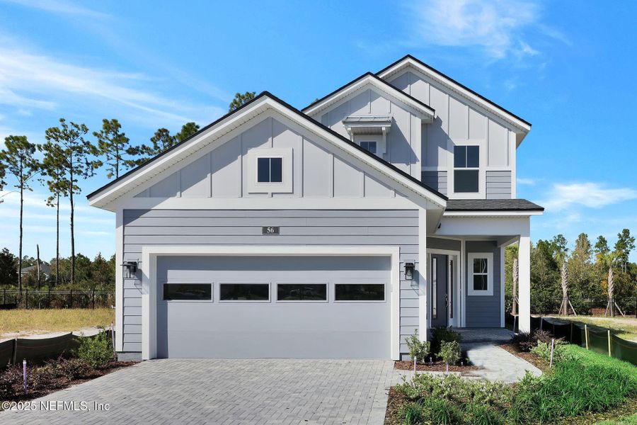 Front exterior of a new home in Crosswinds at Nocatee, Nocatee, FL, highlighting curb appeal (Image 23).