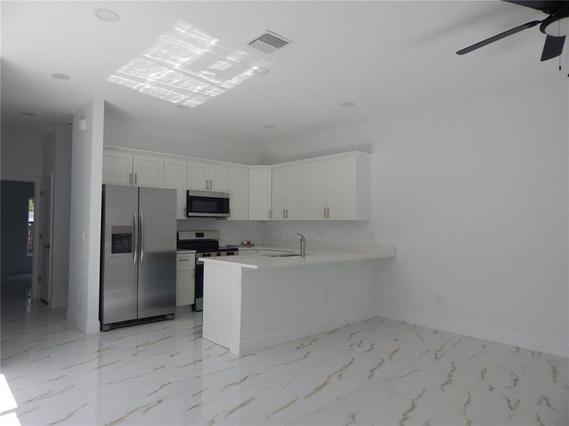 Furnished interior view inside a new home in , Tampa (Image 9).