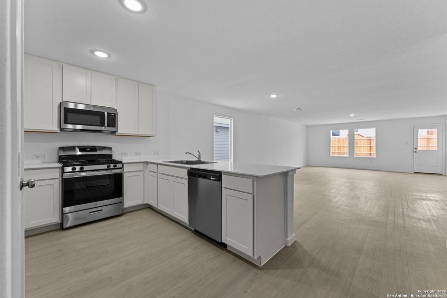 Furnished interior view inside a new home in Voss Farms, New Braunfels (Image 8).