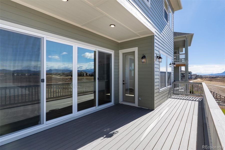 Exterior details and patio area of a home in Revel Crossing at Wolf Ranch - The Panorama Collection, Colorado Springs (Image 3).