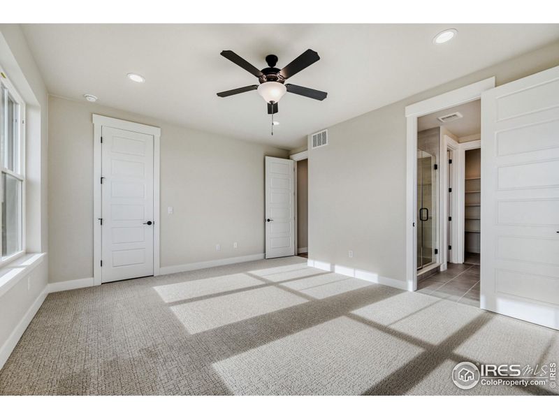 Spacious, unfurnished interior of a new home in Barefoot Lakes, Firestone (Image 22).