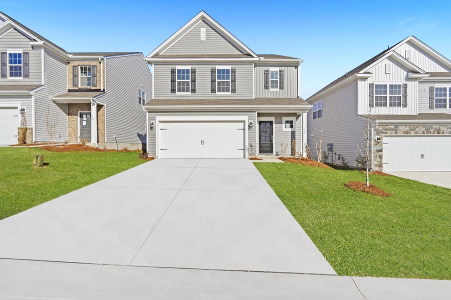 Front exterior of a new home in Neely Park, Woodruff, SC, highlighting curb appeal (Image 1). Front exterior of a new home in Neely Park, Woodruff, SC, highlighting curb appeal (Image 1).