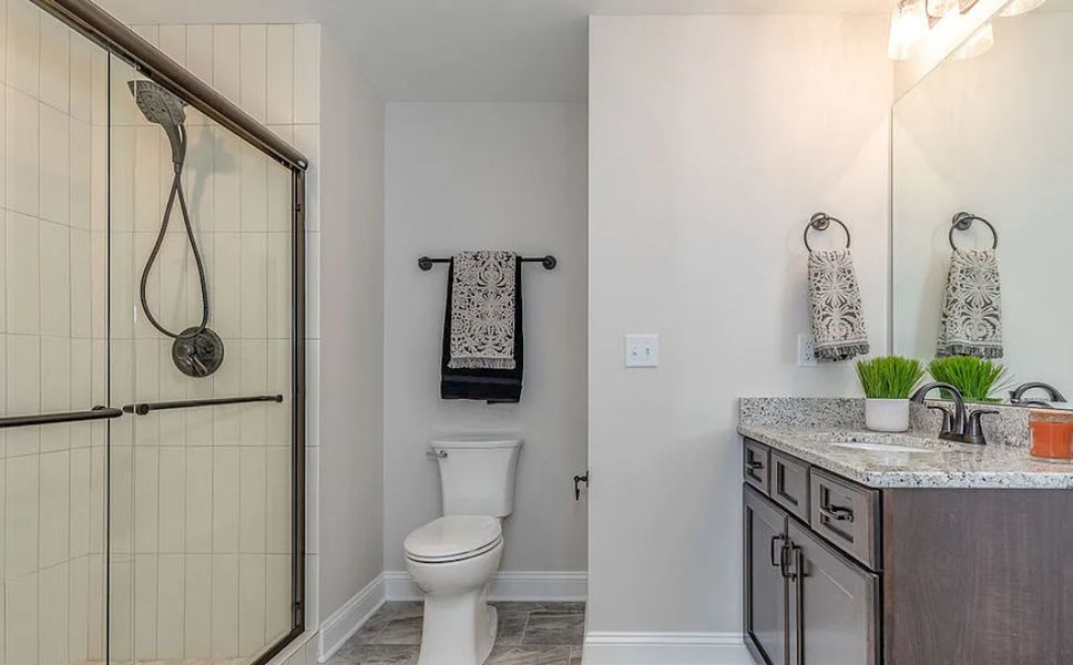 Representative furnished interior of a home built from the Promenade by Perfection Builders in The Courtyards at Oakland Hills, Louisville (Image 13).