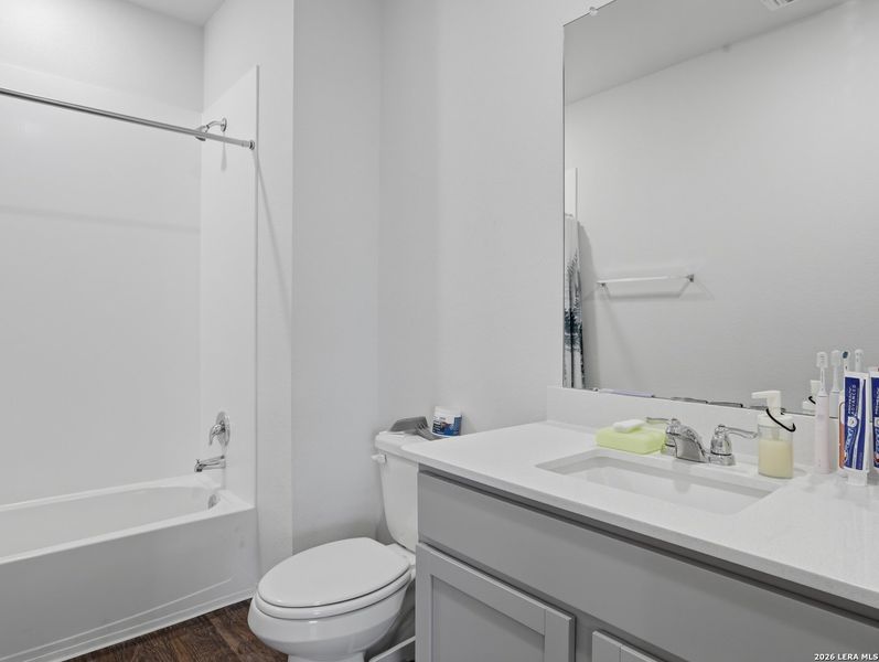 Furnished interior view inside a new home in Watermill, Uhland (Image 10).