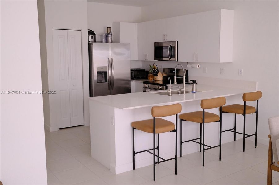 Furnished interior view inside a new home in , Miami (Image 16).