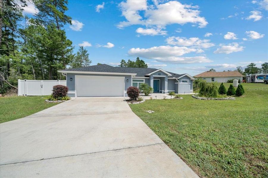 Front exterior of a new home in , Ocala, FL, highlighting curb appeal (Image 19). Front exterior of a new home in , Ocala, FL, highlighting curb appeal (Image 19).
